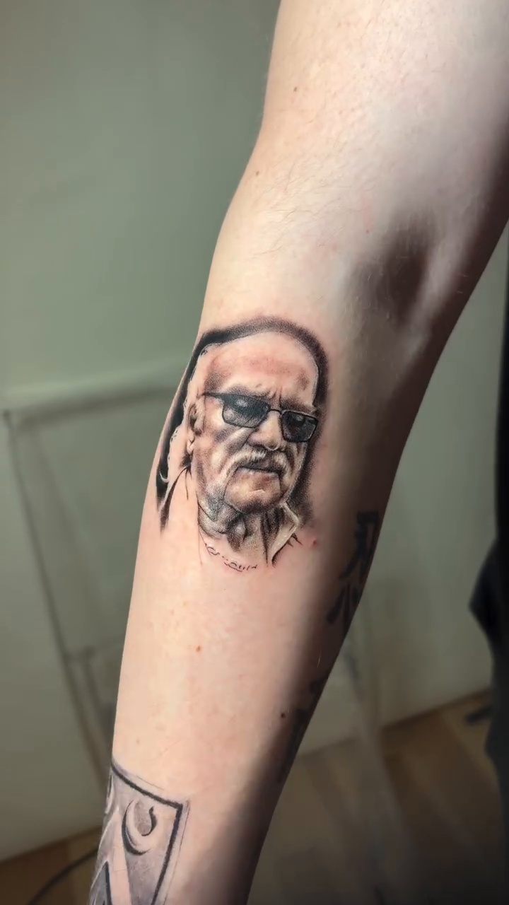 Tattoo by @alexmoska_tattoo — realism, black_and_grey