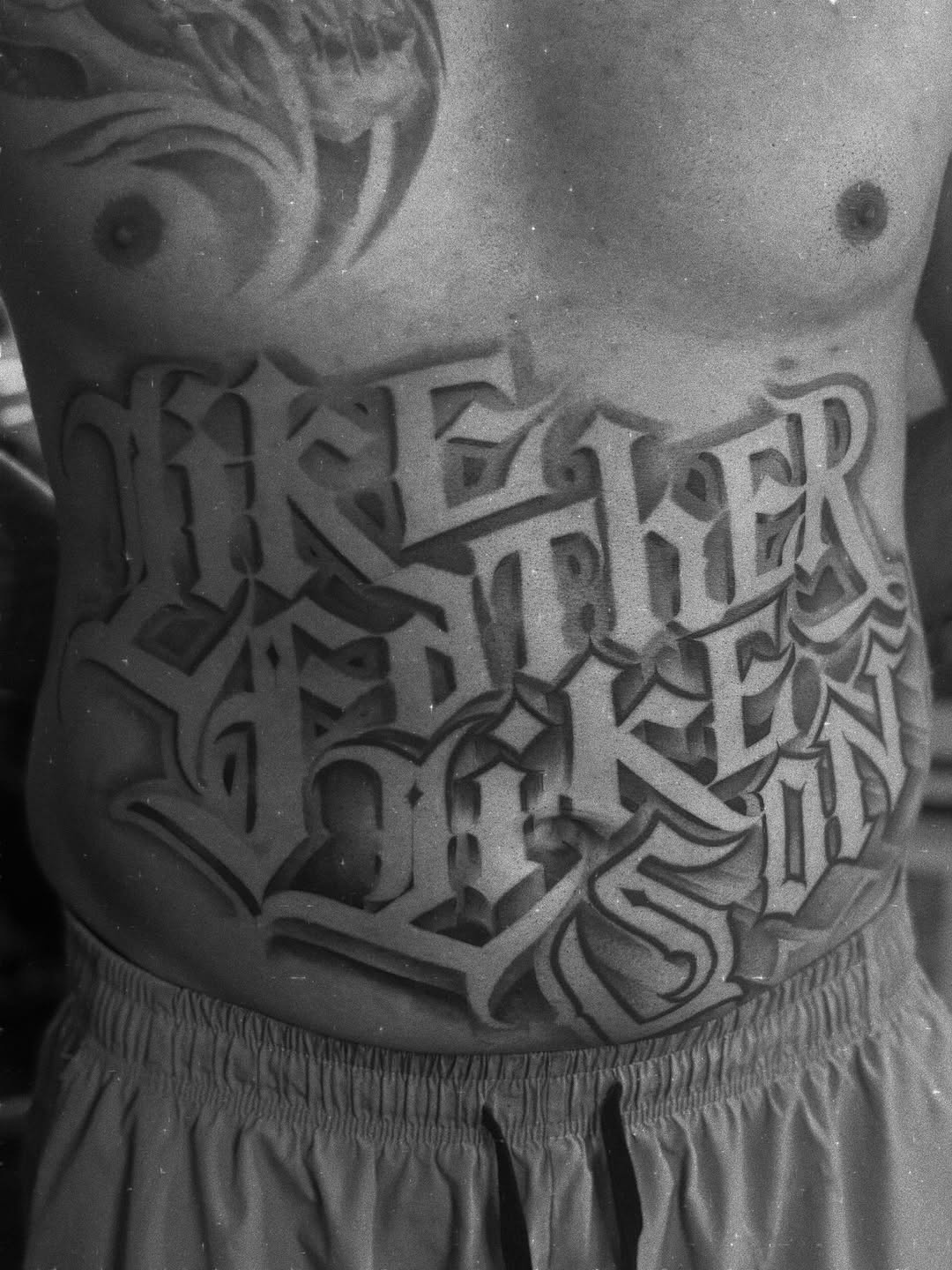 Tattoo by @paul_racks — lettering_script, chicano