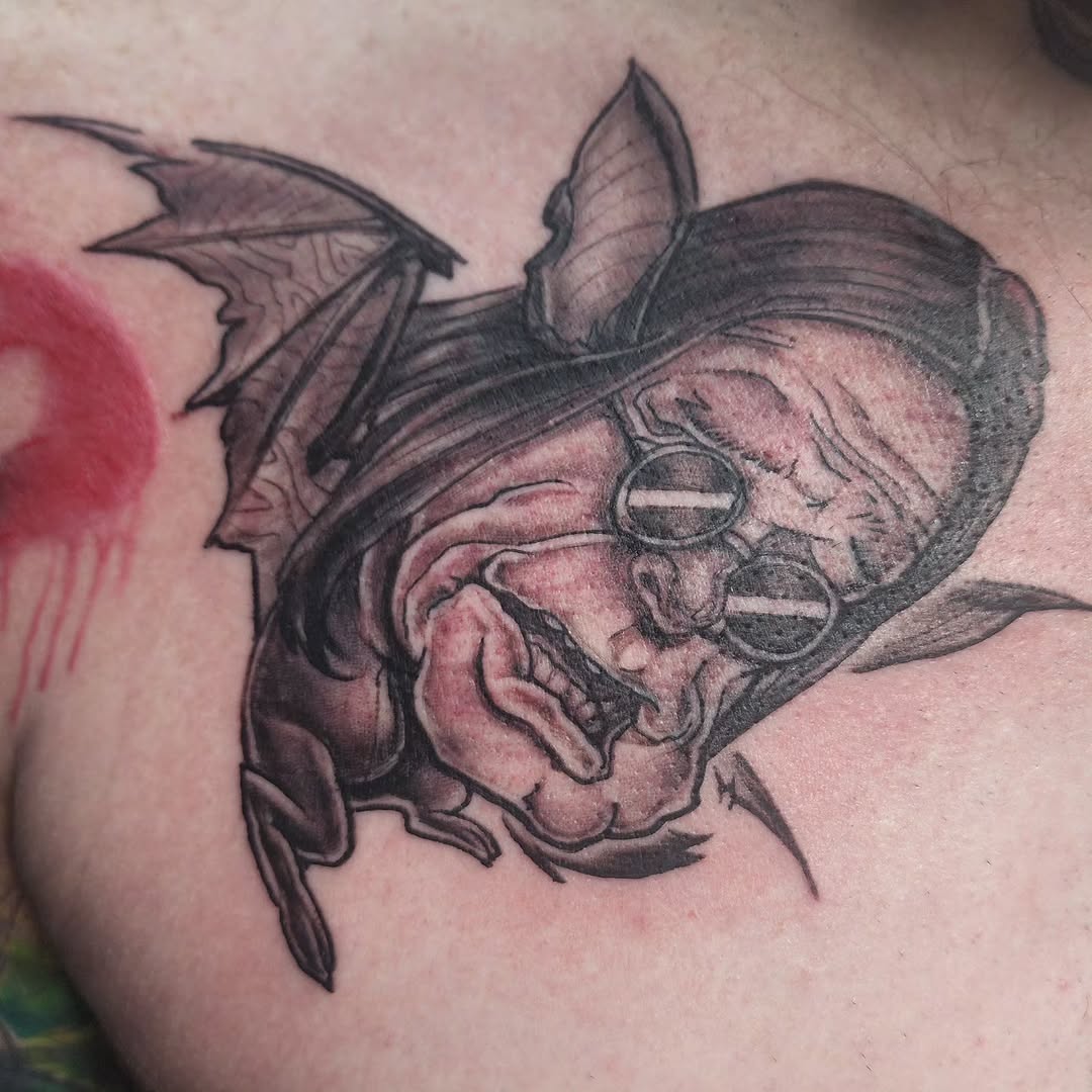 Tattoo by @tattoos.by.kd — dark_realism, black_and_grey