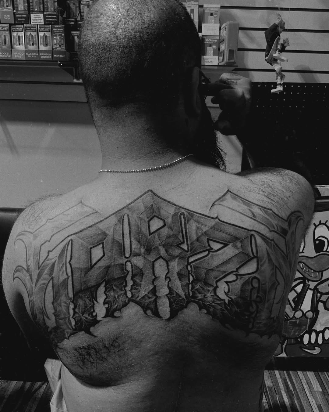 Tattoo by @paul_racks — lettering_script, black_and_grey