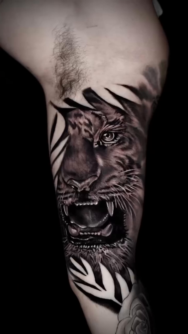 Tattoo by @_dannytats — realism, black_and_grey