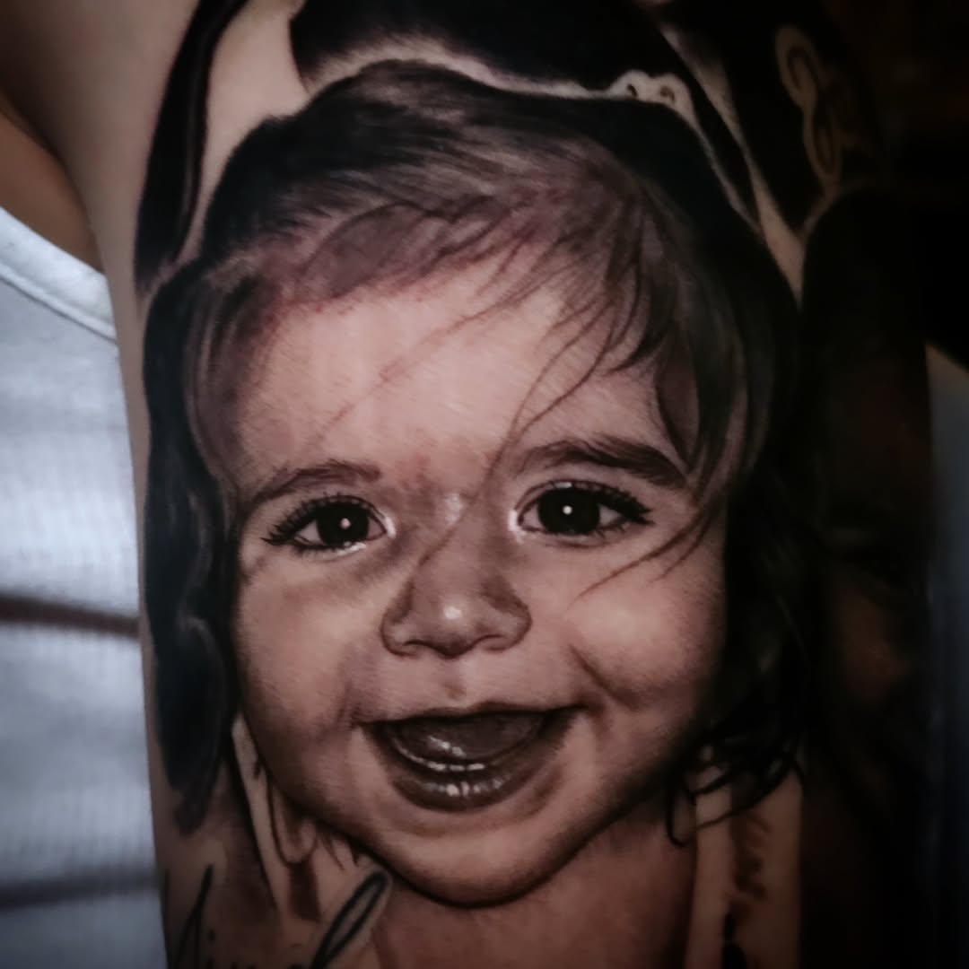Tattoo by @lougottitattoo — realism, black_and_grey