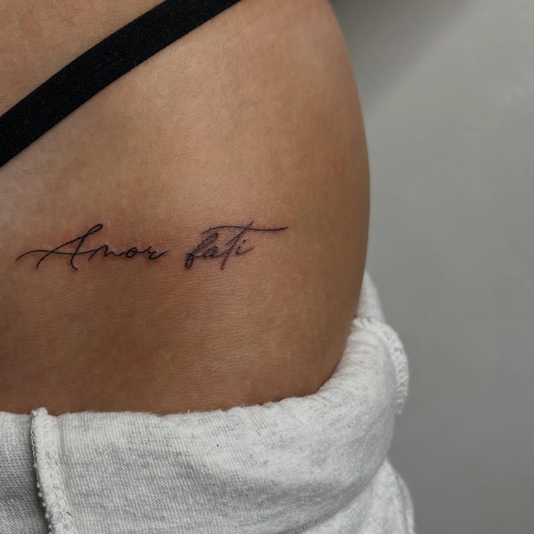 Tattoo by @fineline.tats — lettering_script, fine_line