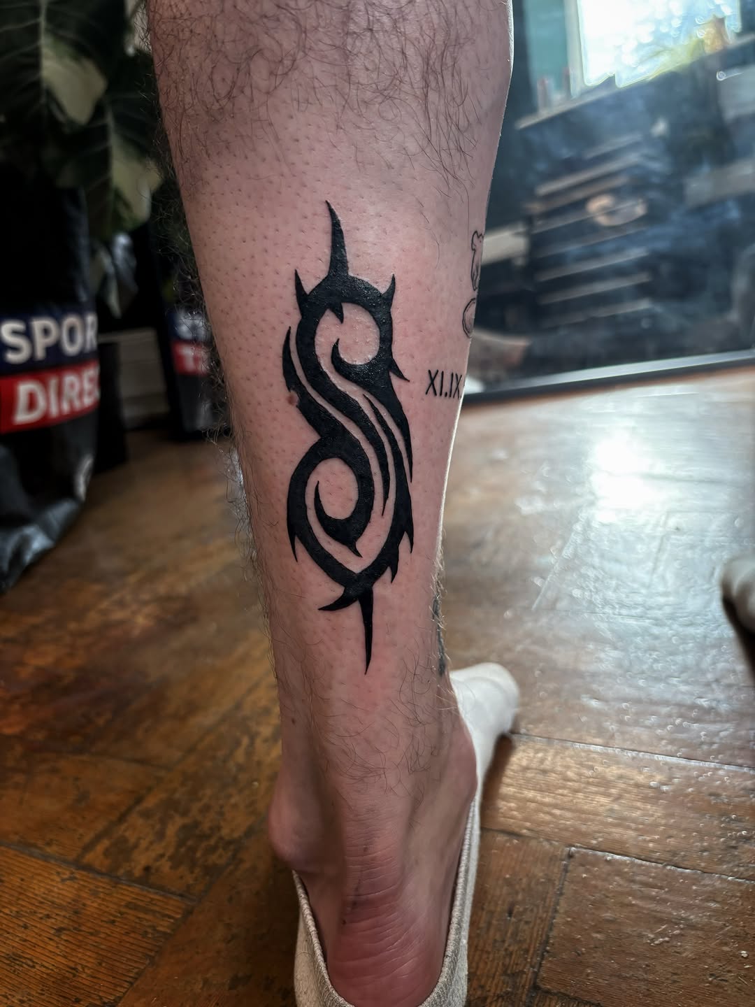 Tattoo by @scorchedbones_ โ blackwork