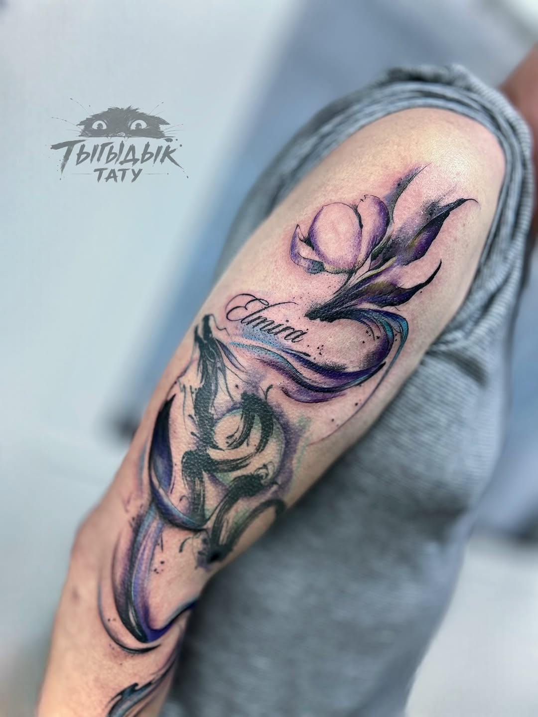 Tattoo by @tygydyk_tattoo — watercolor, lettering_script
