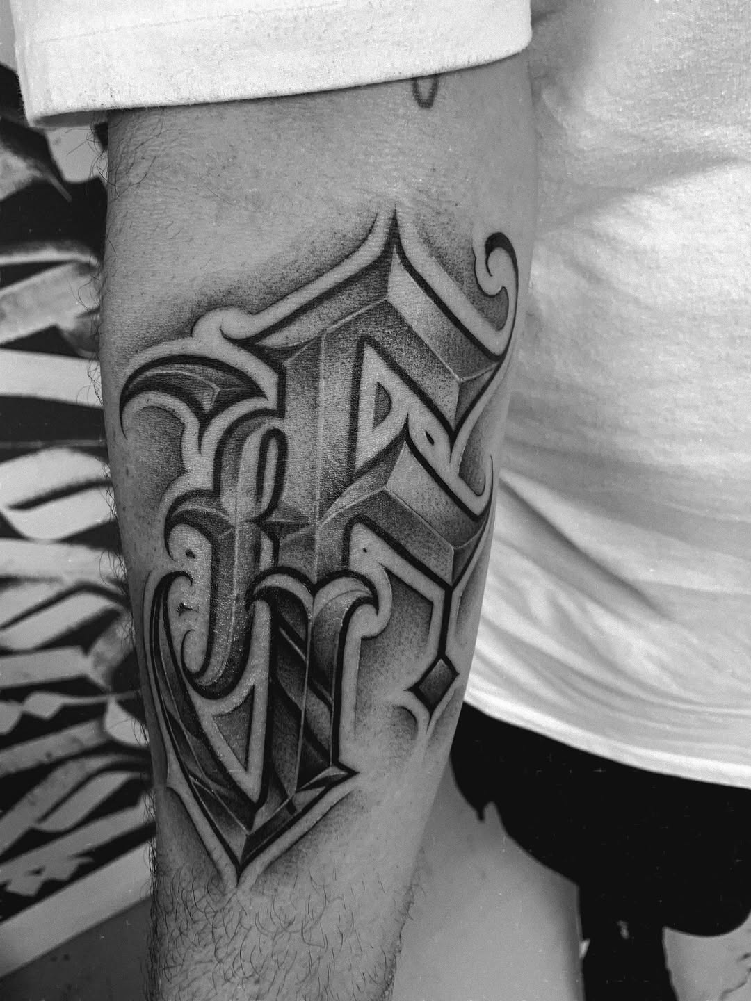 Tattoo by @paul_racks — lettering_script, chicano