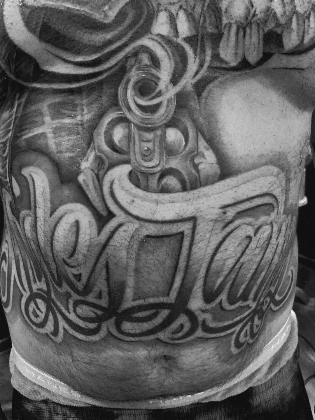 Tattoo by @paul_racks — lettering_script, chicano