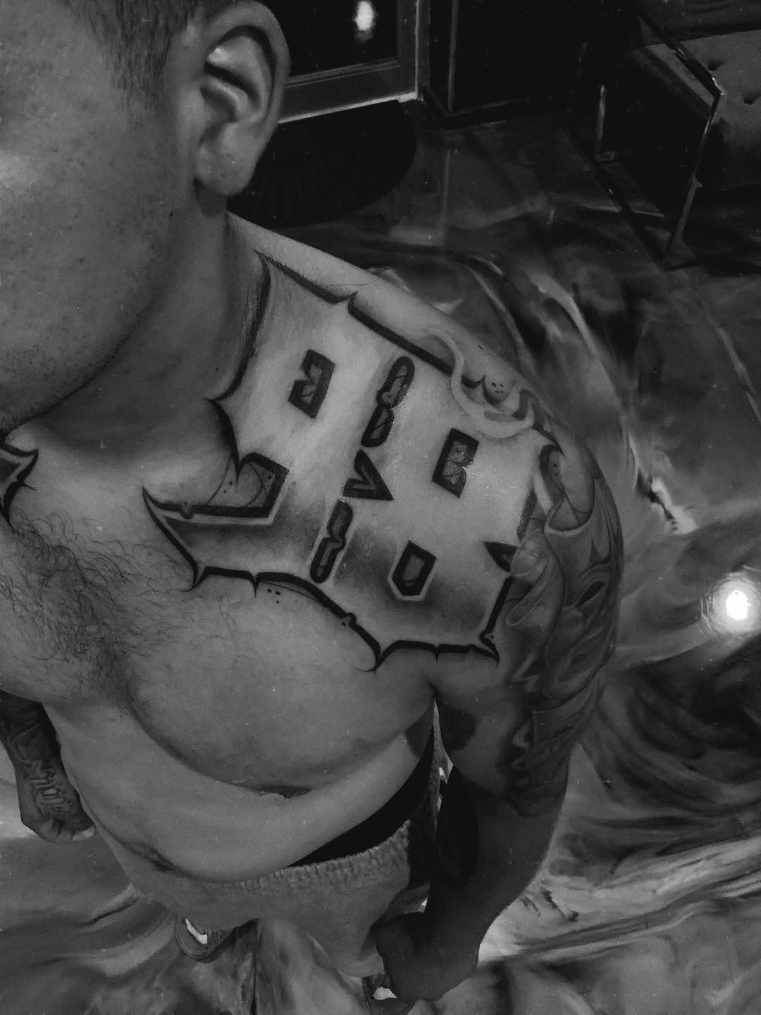Tattoo by @paul_racks — lettering_script, black_and_grey