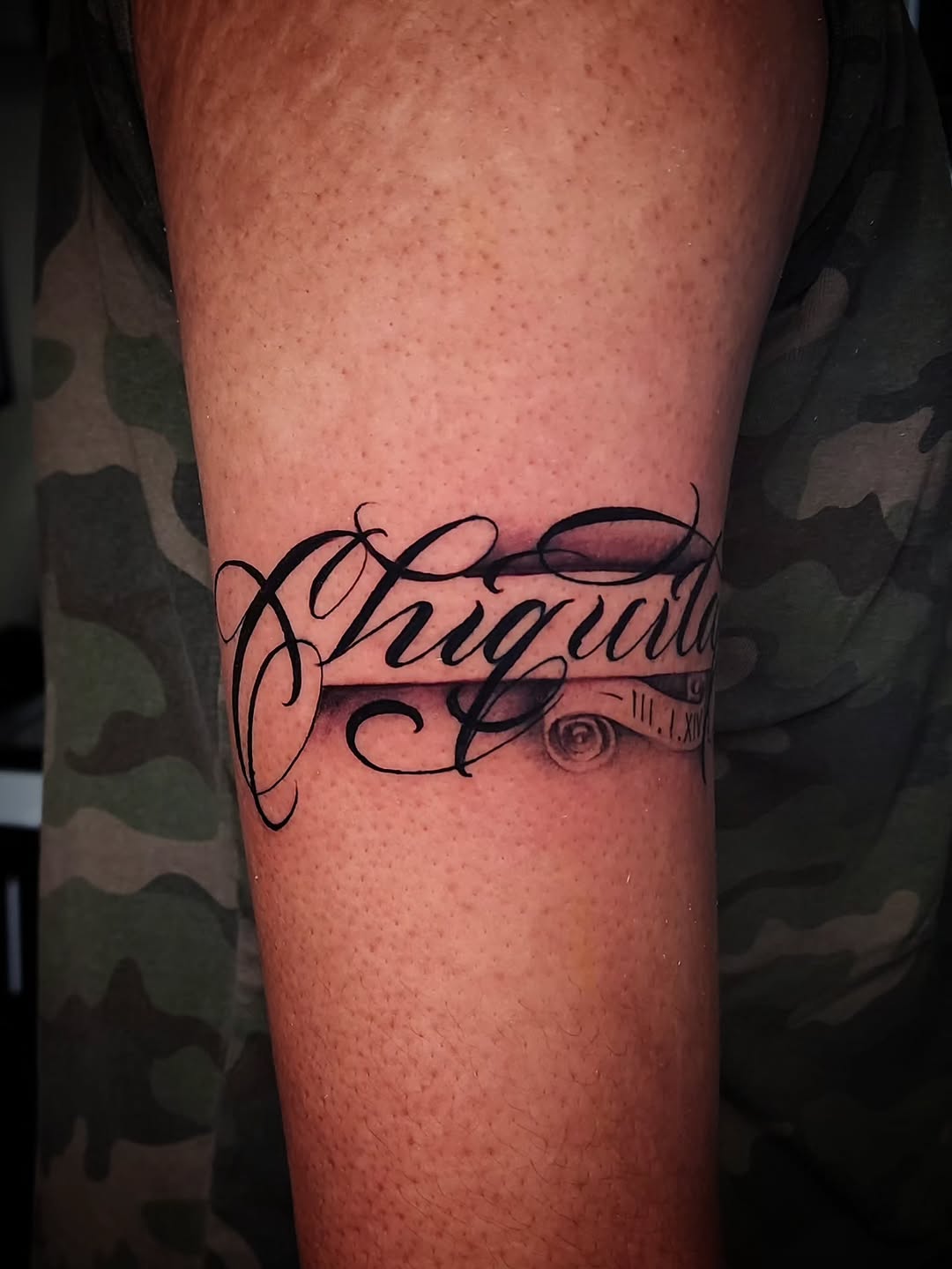 Tattoo by @obsidianinkstudio — lettering_script, chicano
