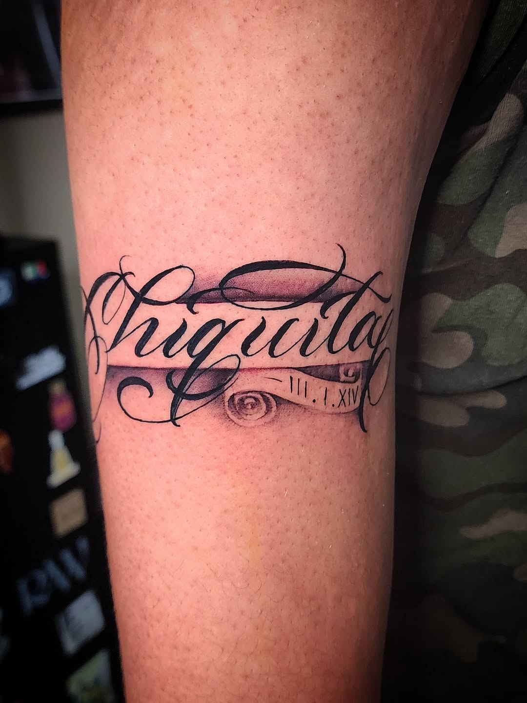 Tattoo by @obsidianinkstudio — lettering_script, chicano