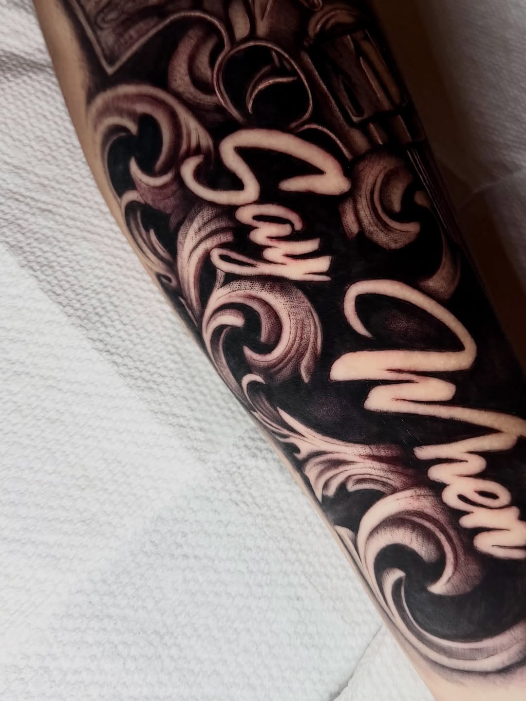 Tattoo by @labonte.tattoos β lettering_script, black_and_grey