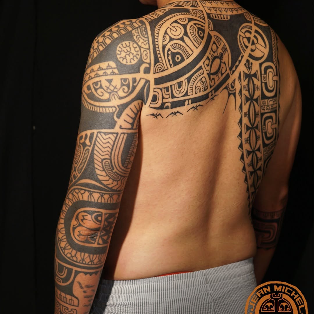 Tattoo by @jeanmichelmanutea โ tribal, blackwork