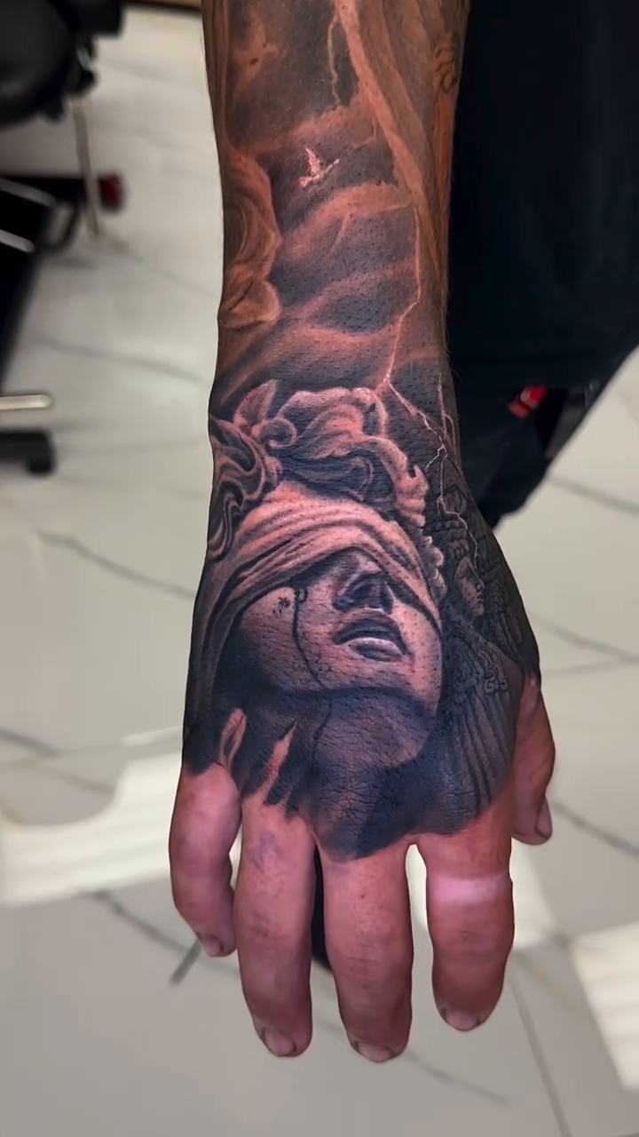 Tattoo by @tuannguyen_tattoo — black_and_grey, realism