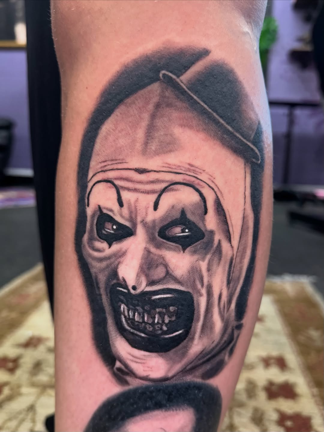 Tattoo by @hellion.ink — realism, black_and_grey