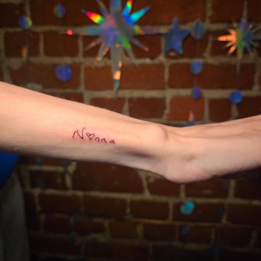 Tattoo by @wildflowers.tattoo — lettering_script, fine_line