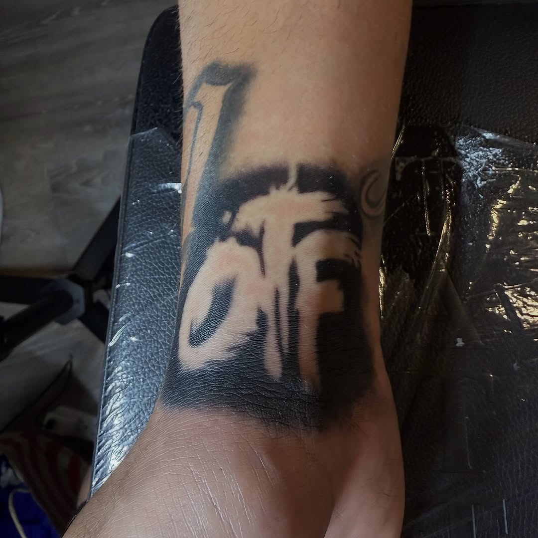 Tattoo by @offdosage.tats โ blackwork, lettering_script