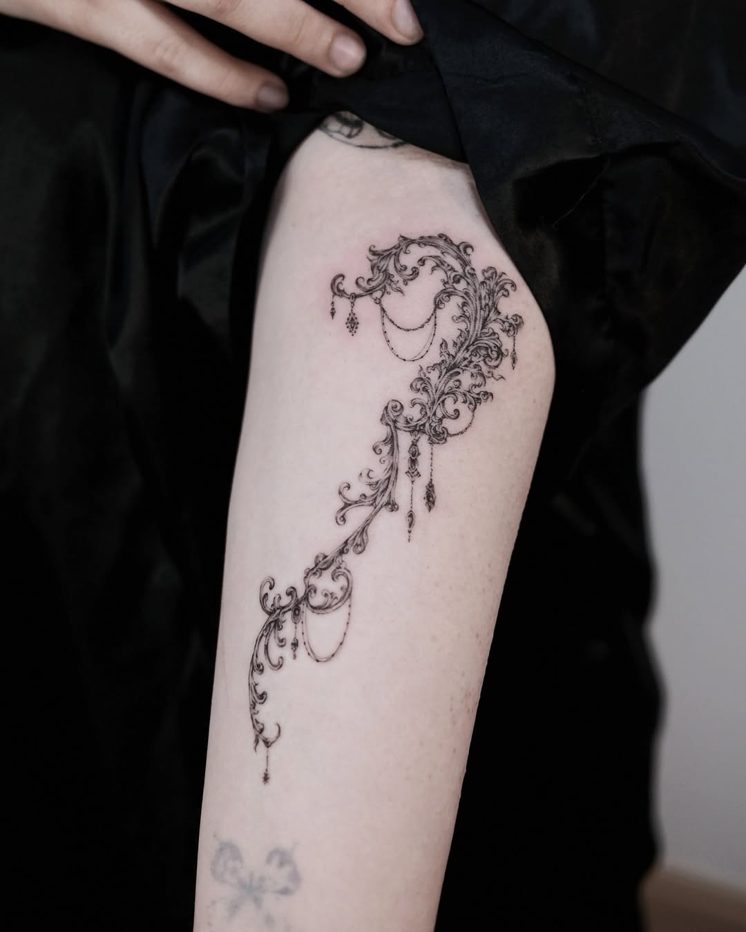Tattoo by @aebak.tt — ornamental, fine_line