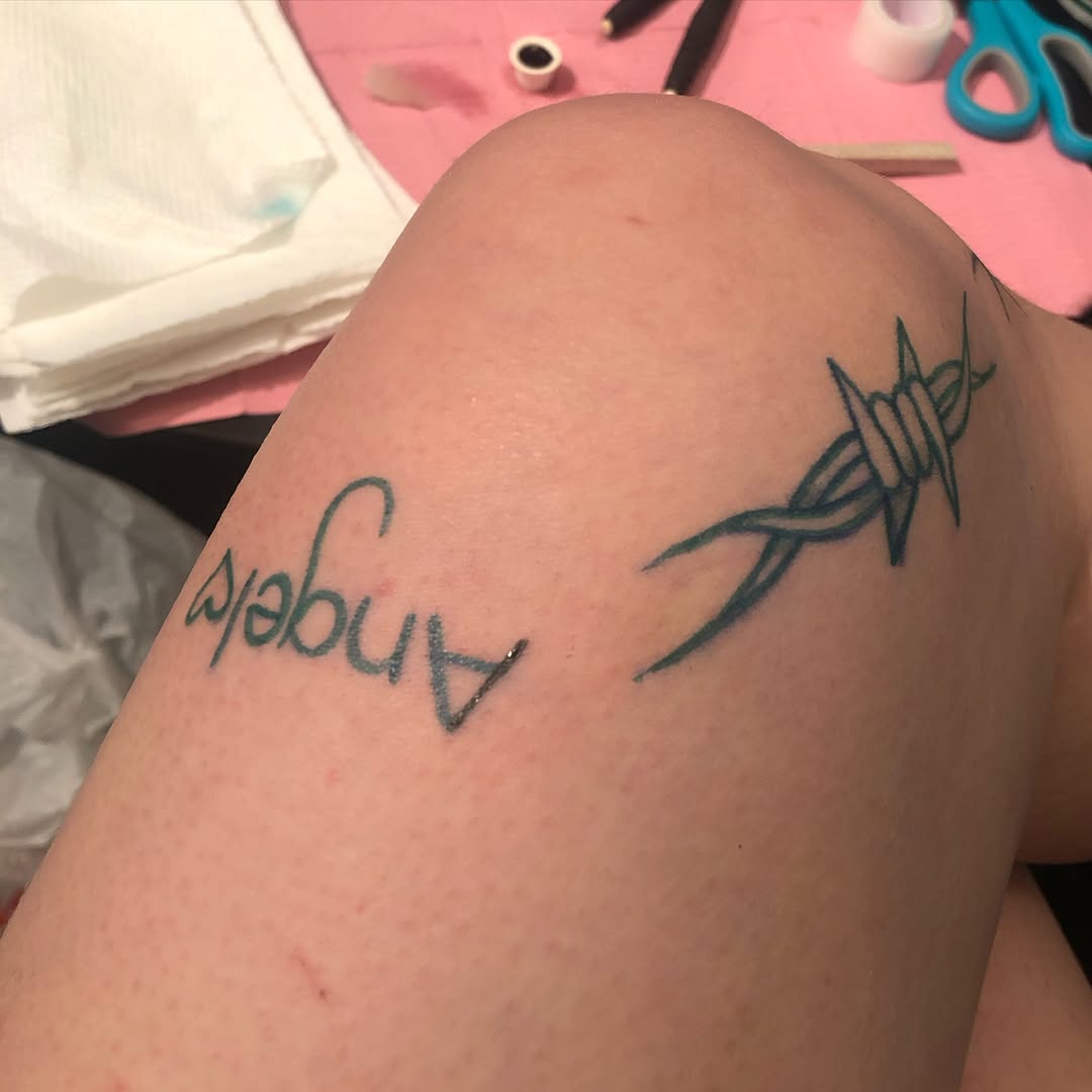 Tattoo by @rat.hearts โ lettering_script, blackwork