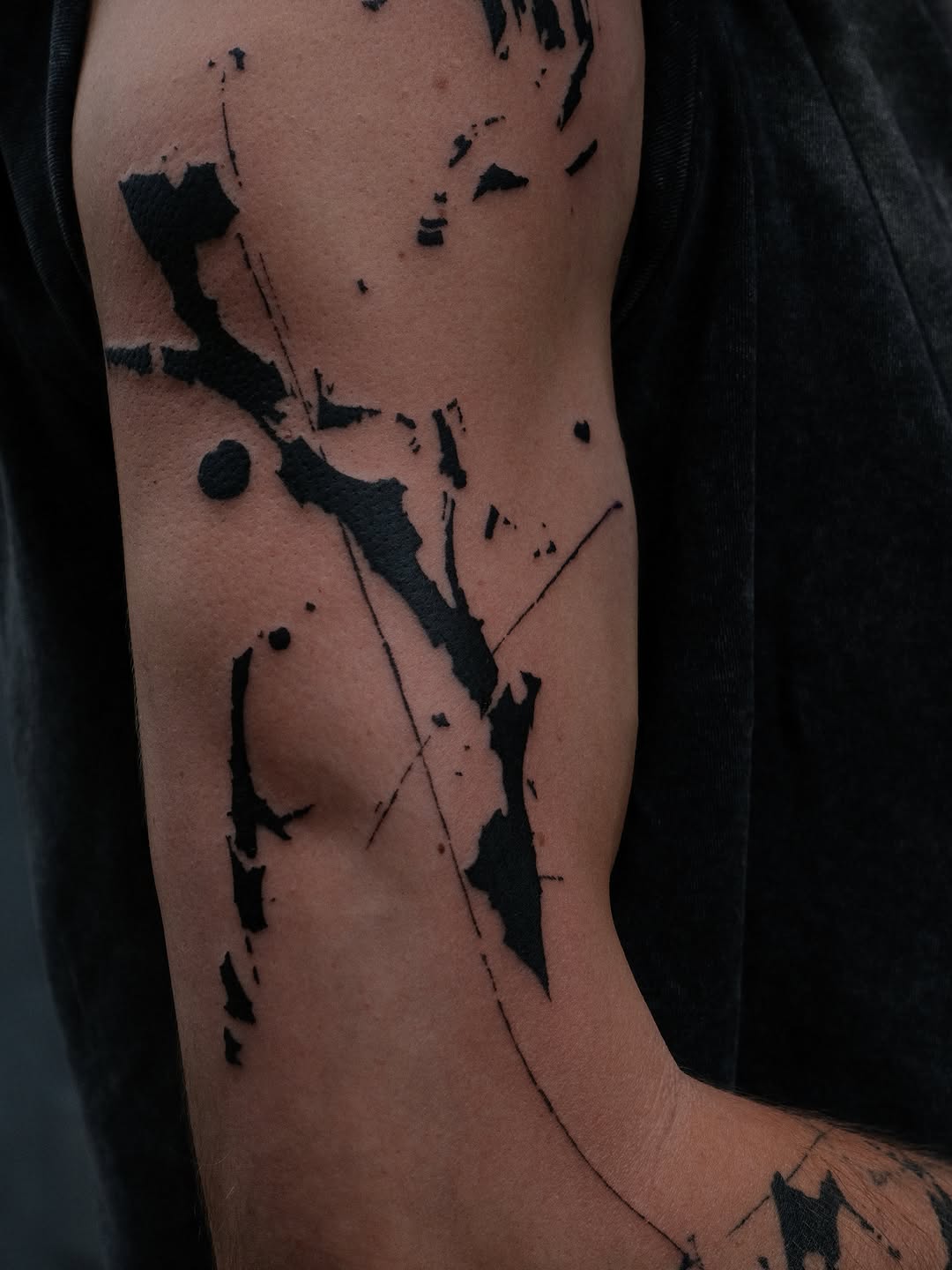 Tattoo by @tolstun.ink โ blackwork, abstract