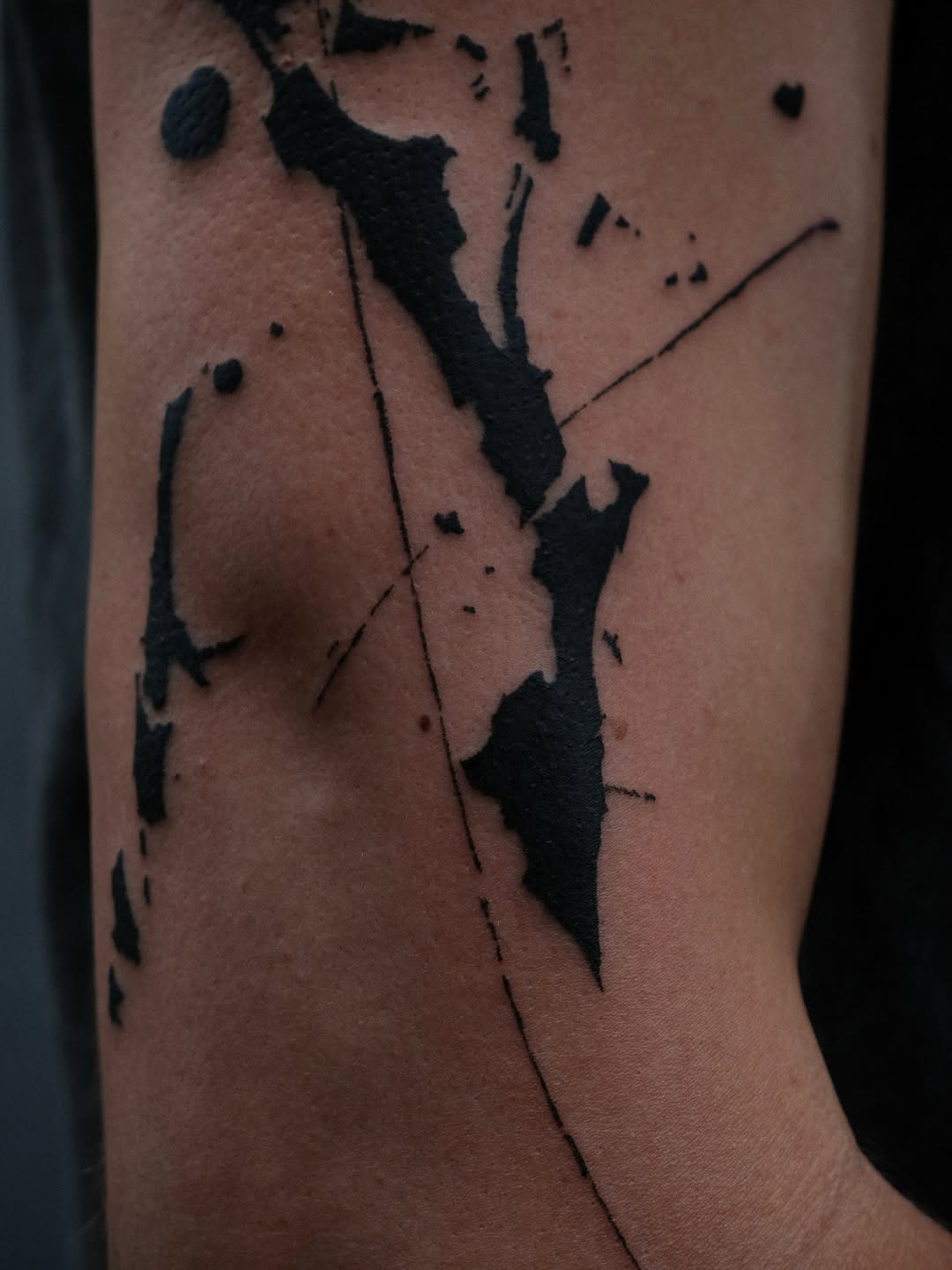 Tattoo by @tolstun.ink โ blackwork, abstract