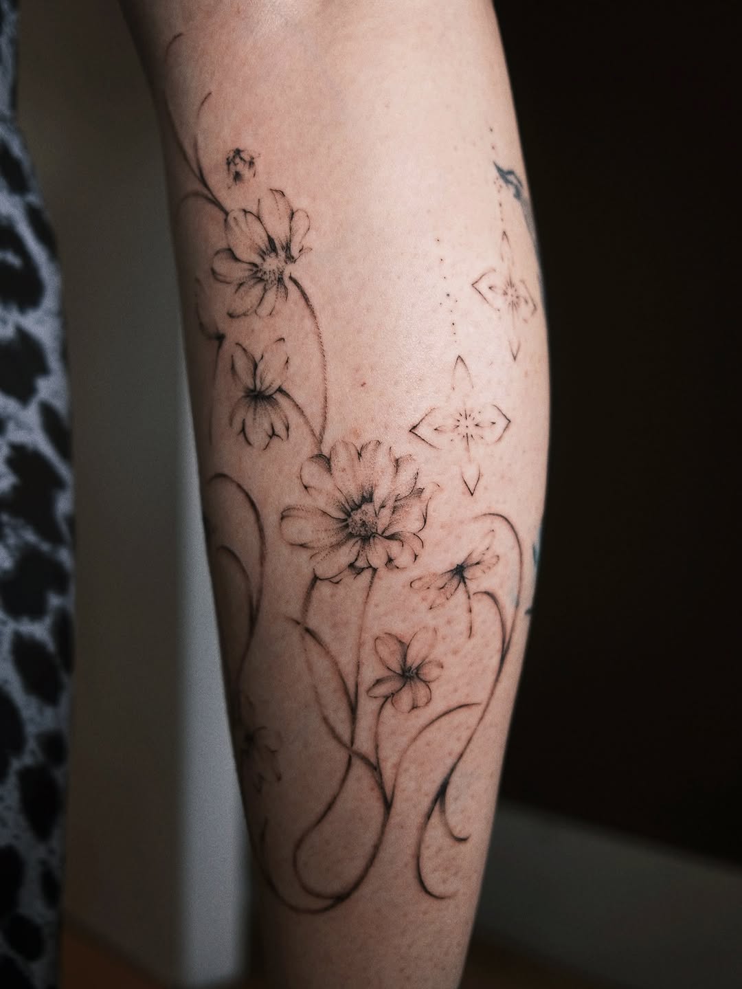 Tattoo by @ren.inks — fine_line, black_and_grey