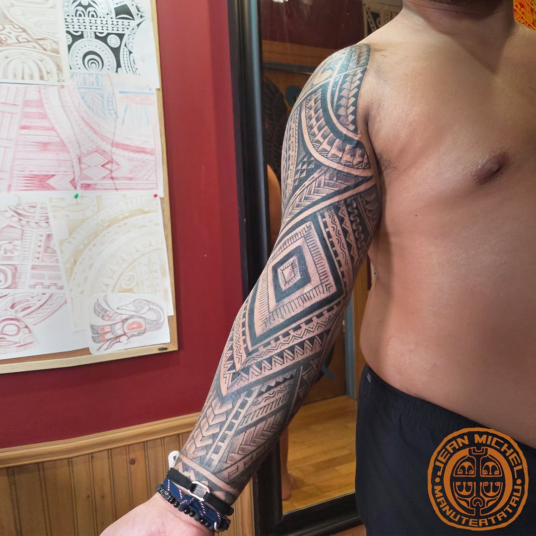 Tattoo by @jeanmichelmanutea โ tribal, blackwork