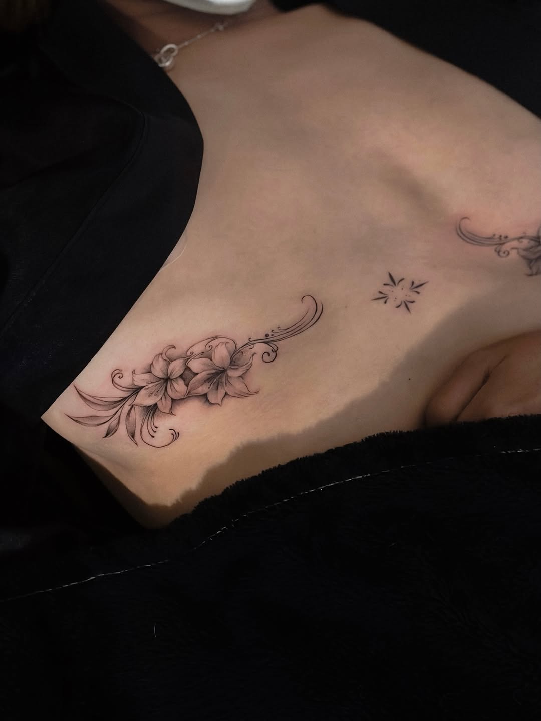 Tattoo by @noir_ink.tattookorat — fine_line, black_and_grey