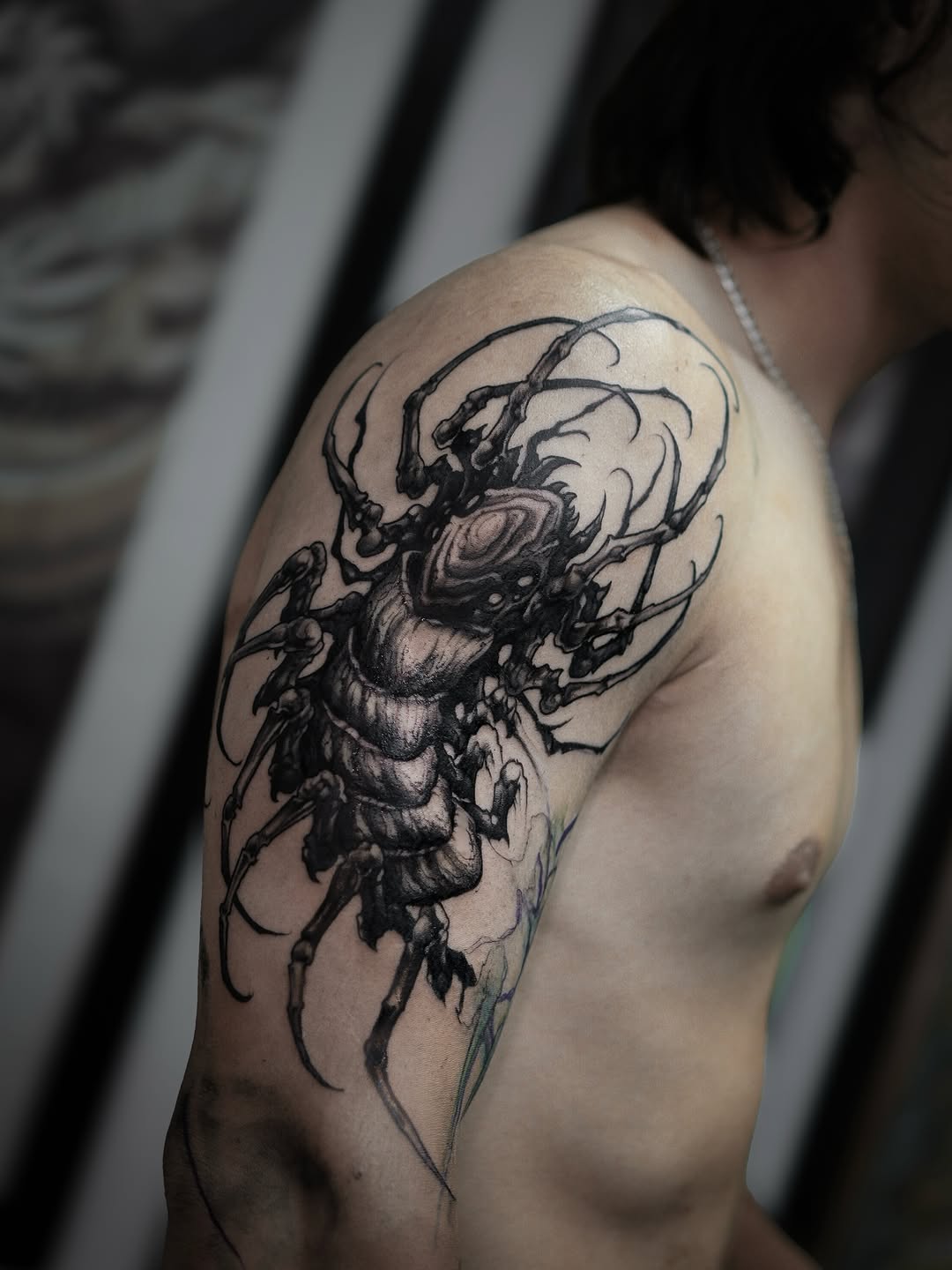 Tattoo by @crawlspace_tattoo โ dark_realism, black_and_grey
