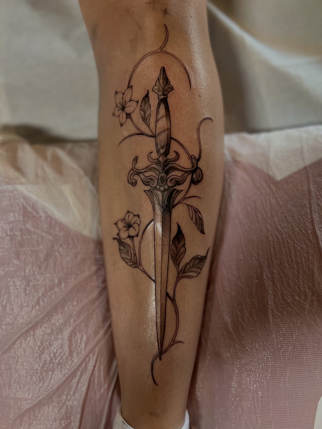 Tattoo by @makoto.tattooarts — fine_line, black_and_grey