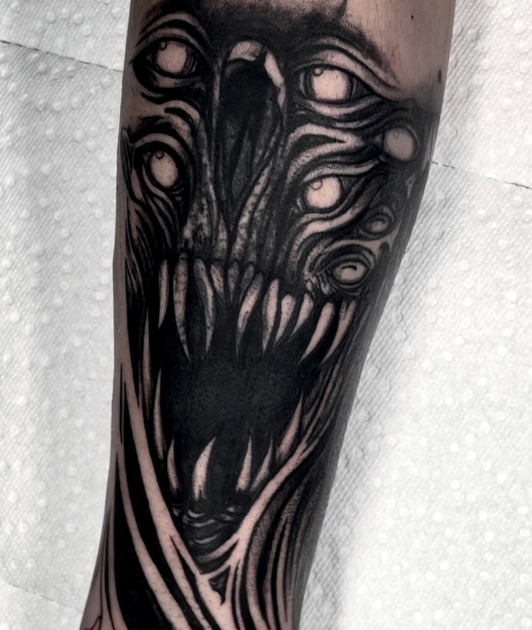 Tattoo by @ergot.tattoo — black_and_grey, dark_realism
