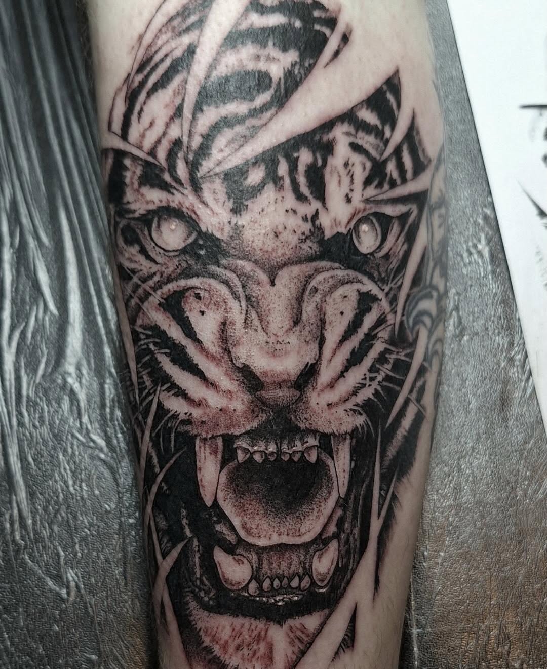 Tattoo by @darren_artwork โ realism, black_and_grey