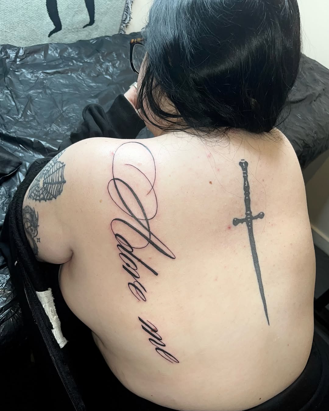 Tattoo by @mwah.ttt — lettering_script, black_and_grey