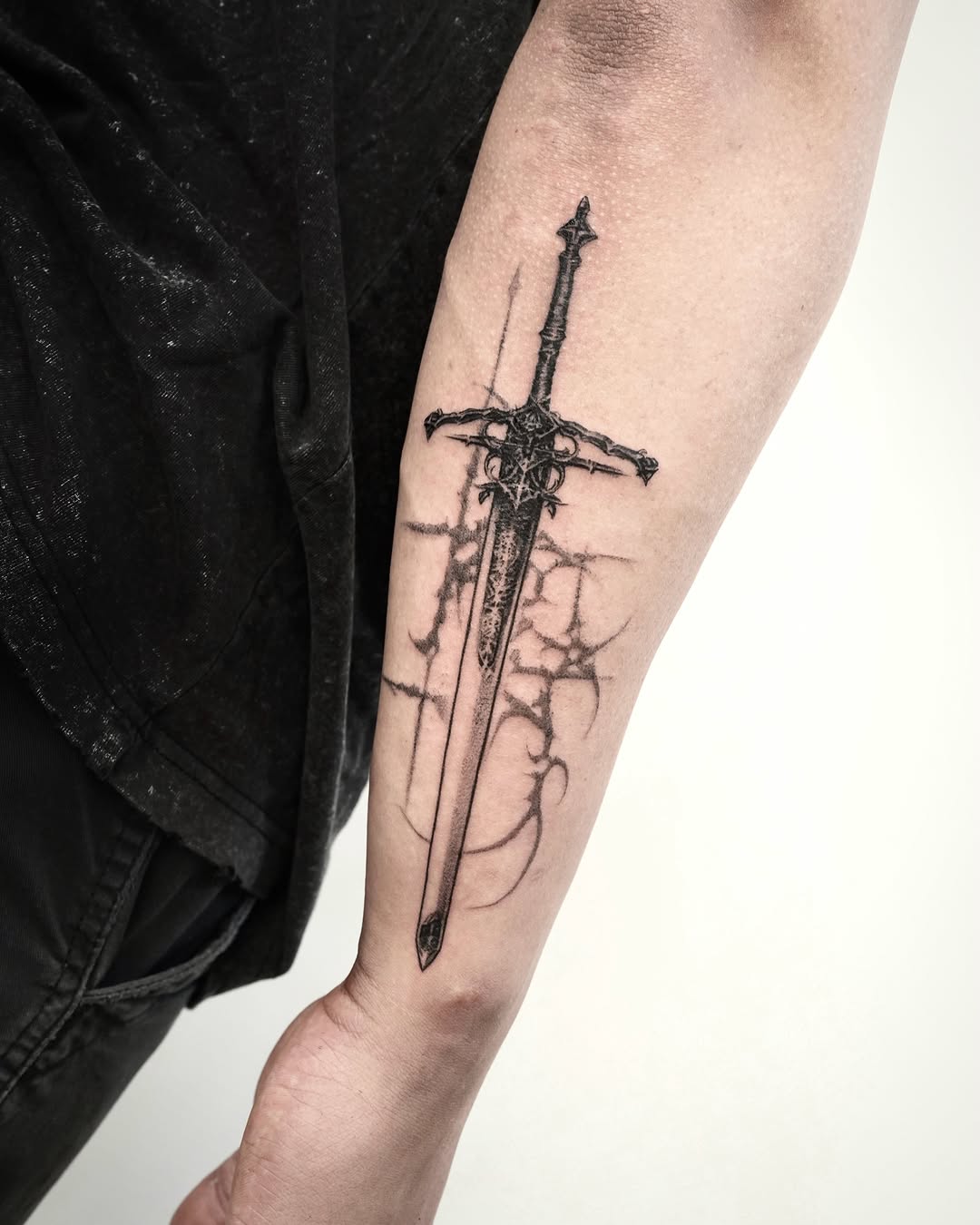 Tattoo by @gun_tattooist — black_and_grey, dark_realism