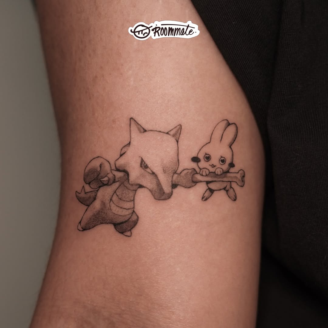 Tattoo by @roommate_tat — anime, black_and_grey