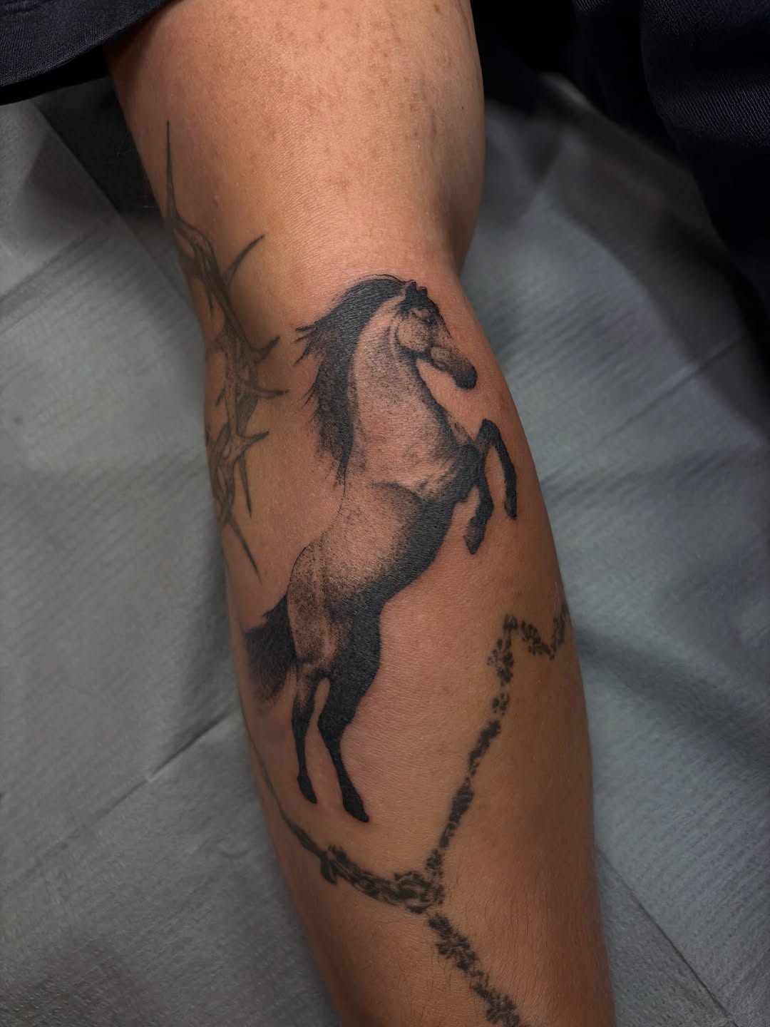 Tattoo by @neildoestattoos — realism, black_and_grey