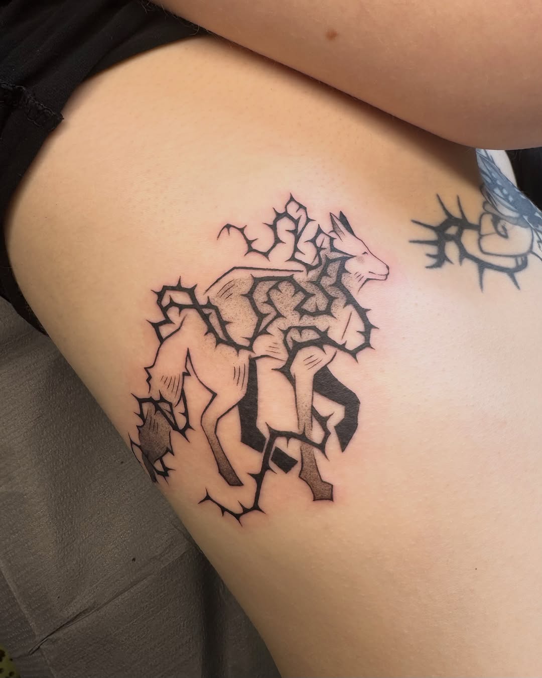 Tattoo by @scaredy.cat.tatts — blackwork, geometric