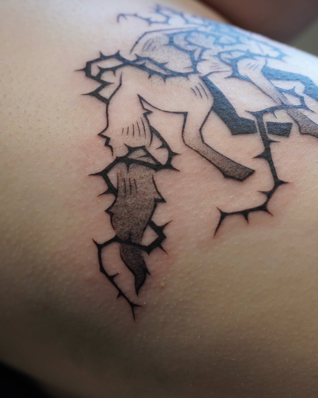 Tattoo by @scaredy.cat.tatts — black_and_grey, illustrative
