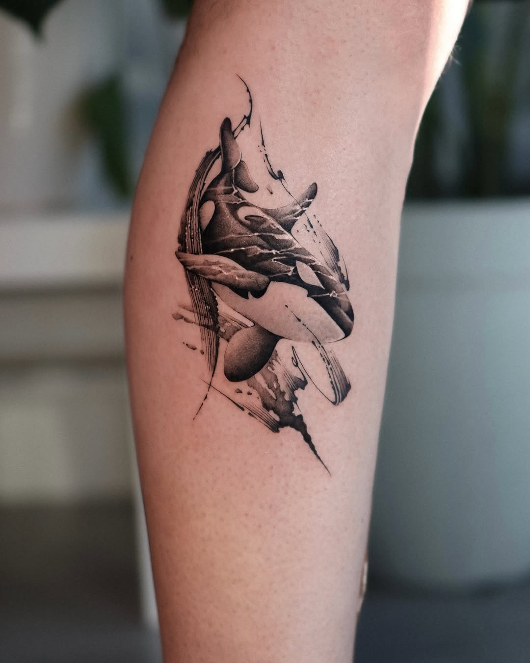 Tattoo by @orca._ink — black_and_grey, illustrative