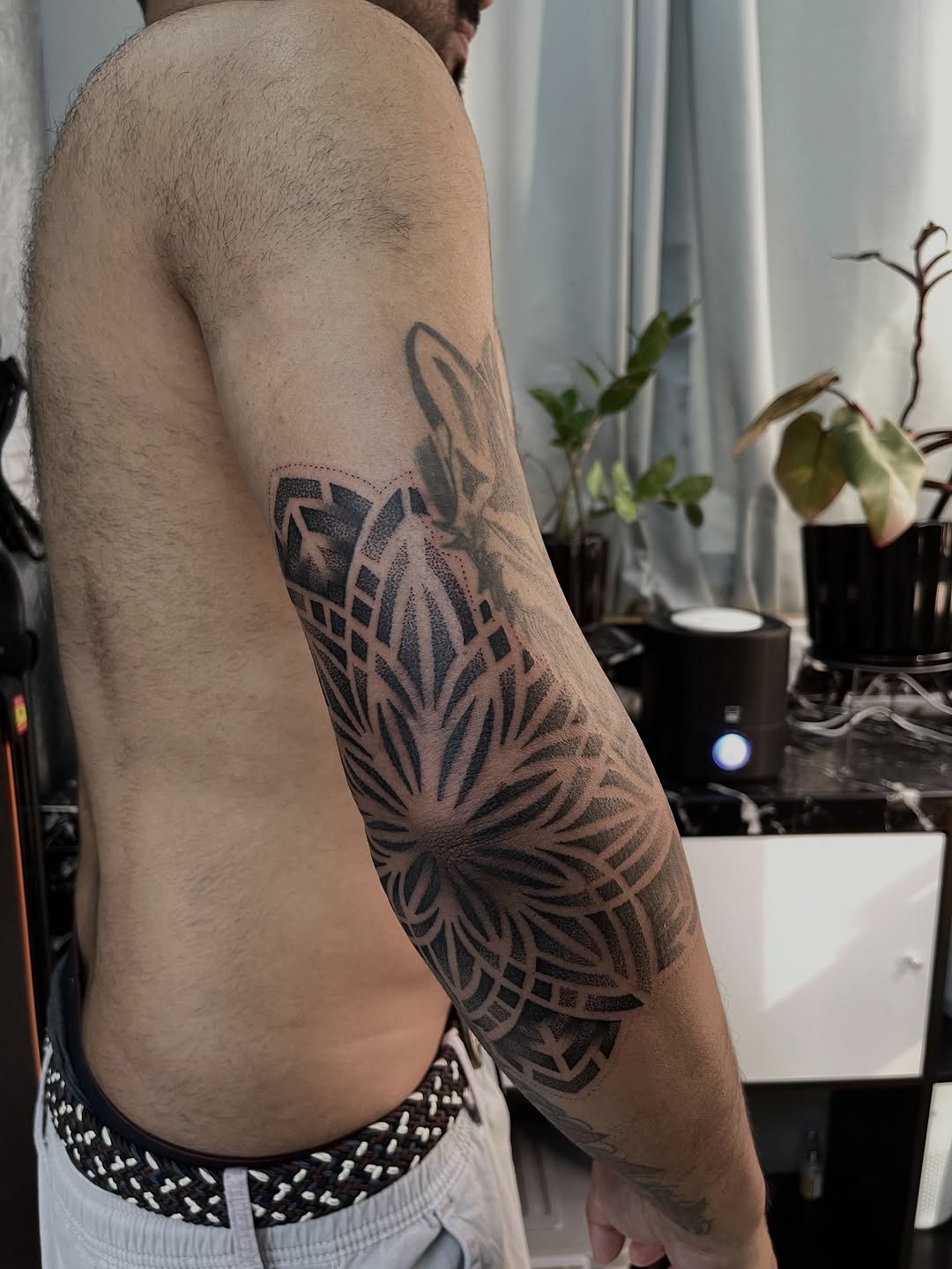 Tattoo by @russellefandialan โ geometric, dotwork