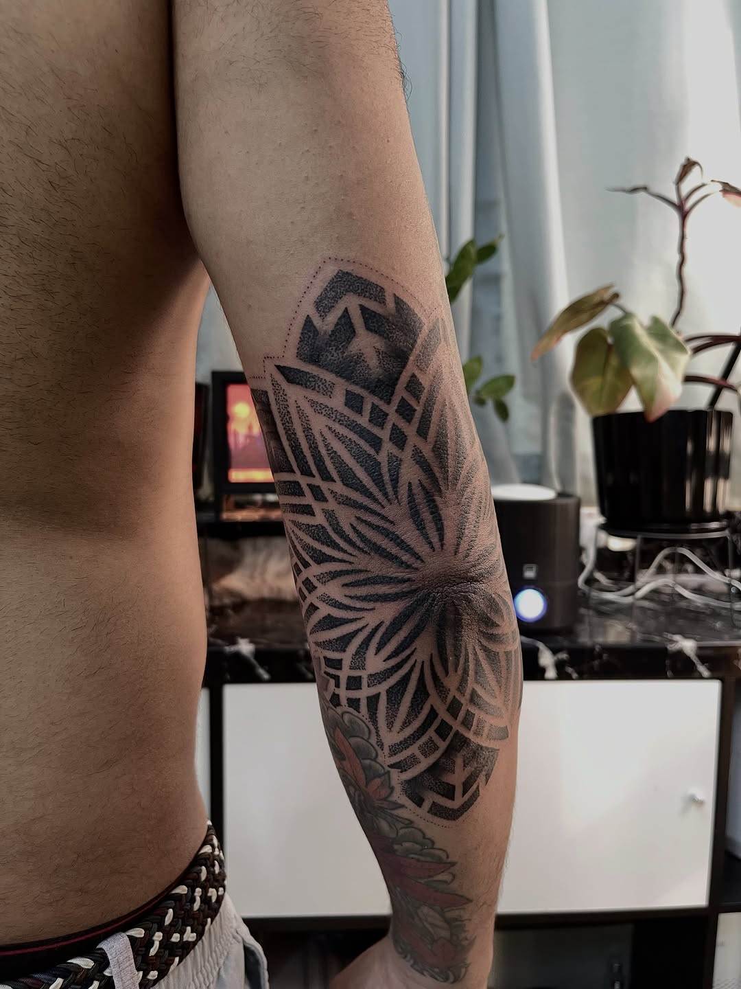 Tattoo by @russellefandialan โ geometric, dotwork