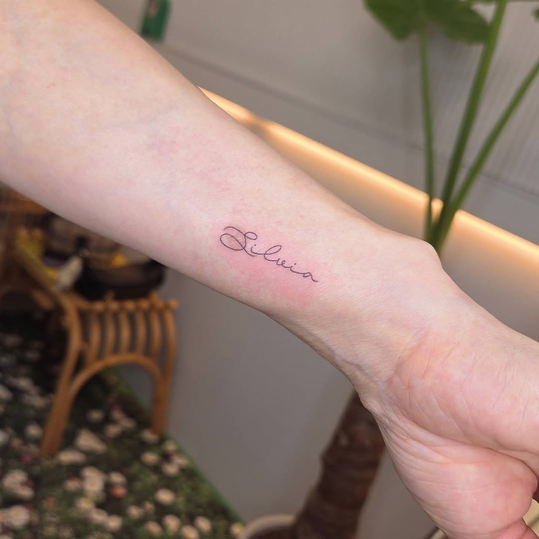 Tattoo by @nurimoon_tattoo — lettering_script, fine_line