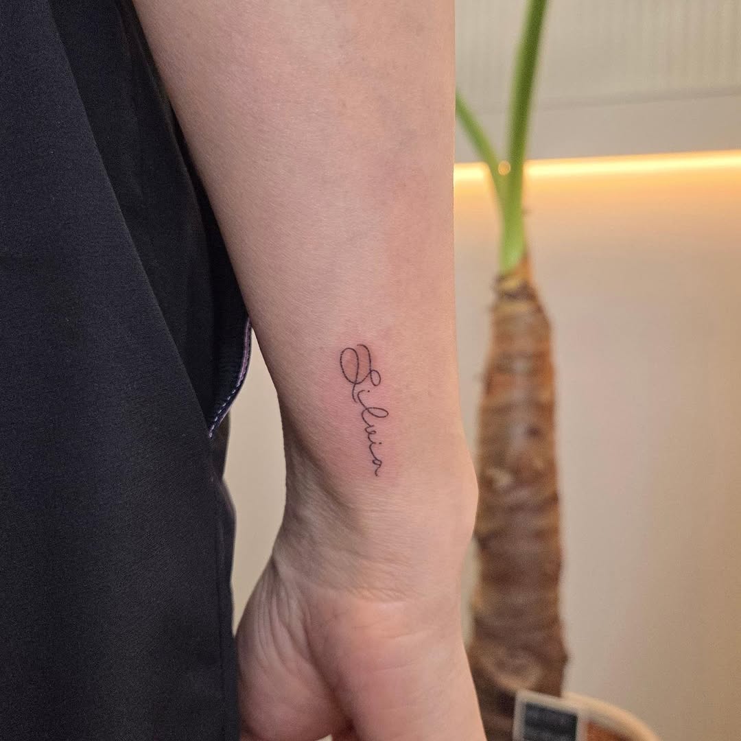 Tattoo by @nurimoon_tattoo — lettering_script, fine_line