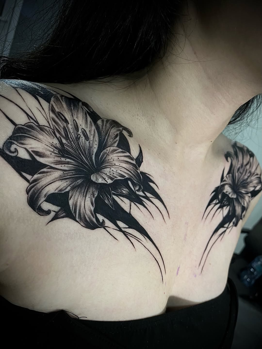 Tattoo by @aifos_arts94 — black_and_grey, realism