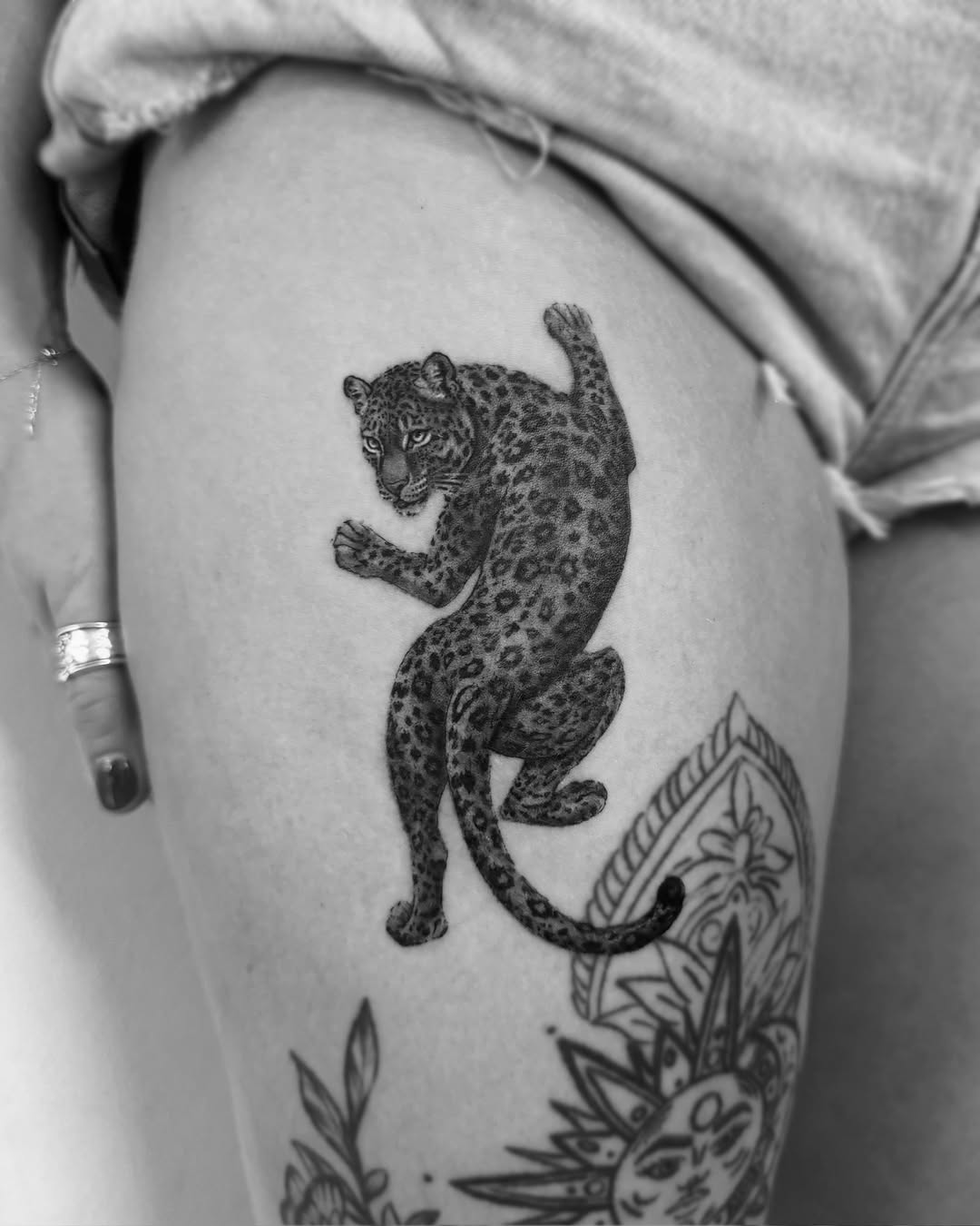 Tattoo by @em.isabella_ink โ realism, black_and_grey