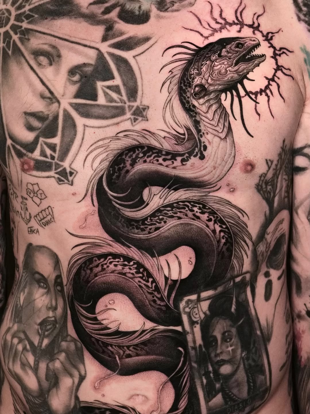 Tattoo by @47volt β realism, black_and_grey