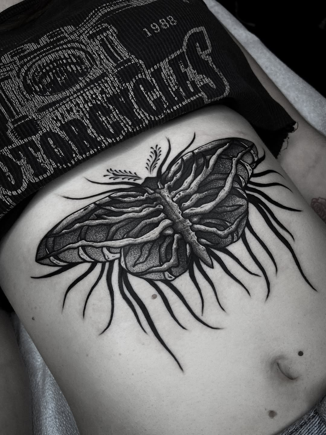 Tattoo by @bunche_tattoo โ black_and_grey, dotwork