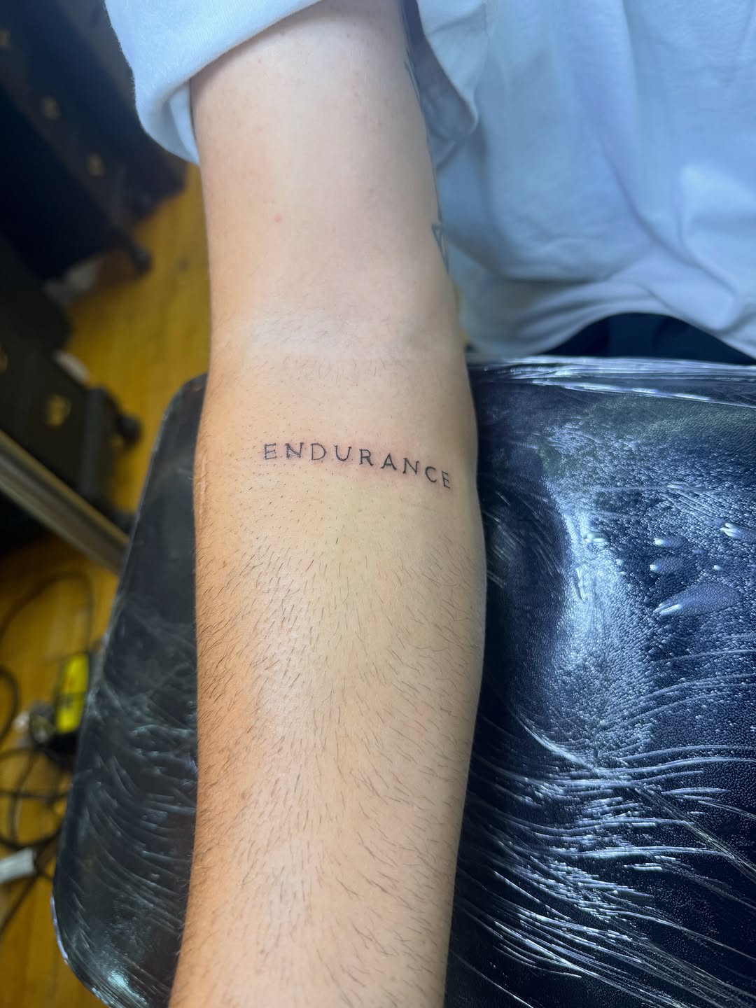 Tattoo by @inked_by_parisapple — lettering_script, fine_line