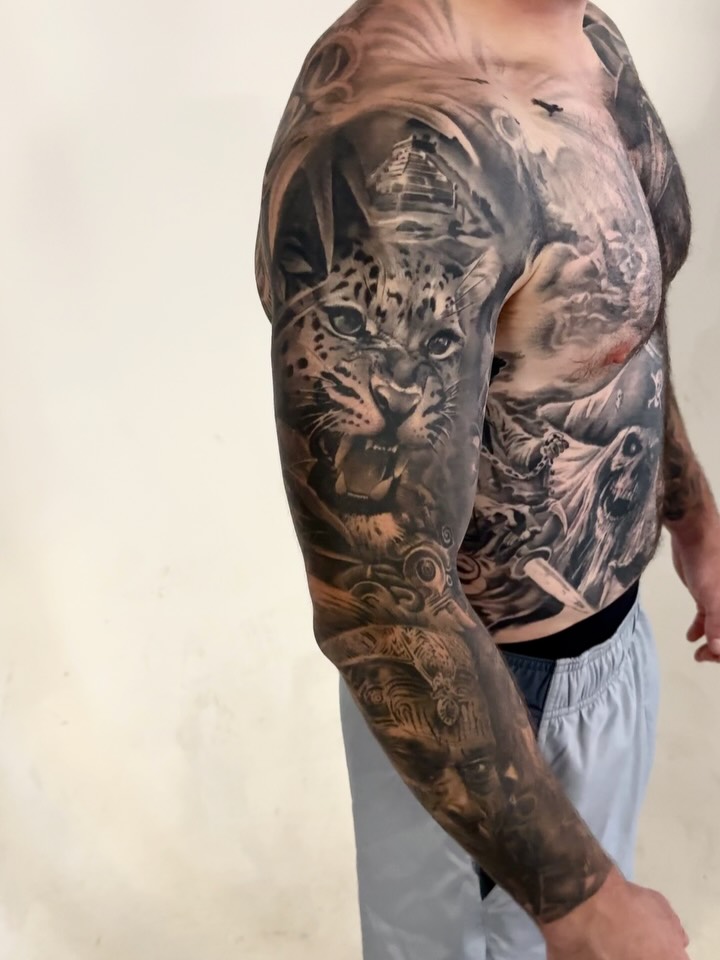 Tattoo by @robdansontattoo — realism, black_and_grey