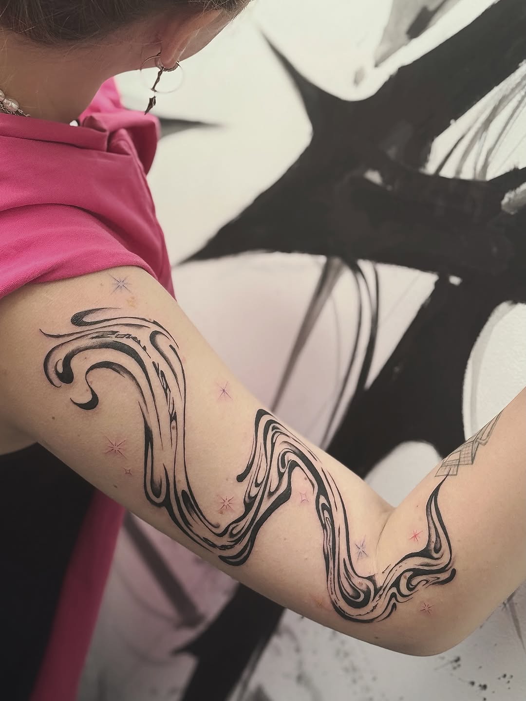 Tattoo by @masha.khelik.ttt — blackwork, abstract