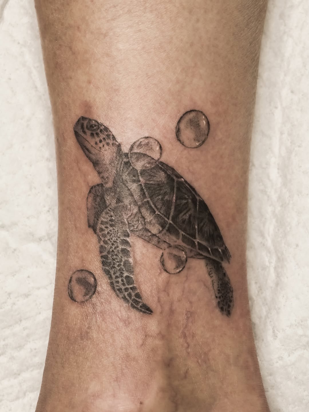 Tattoo by @lunatik_ttt — realism, black_and_grey